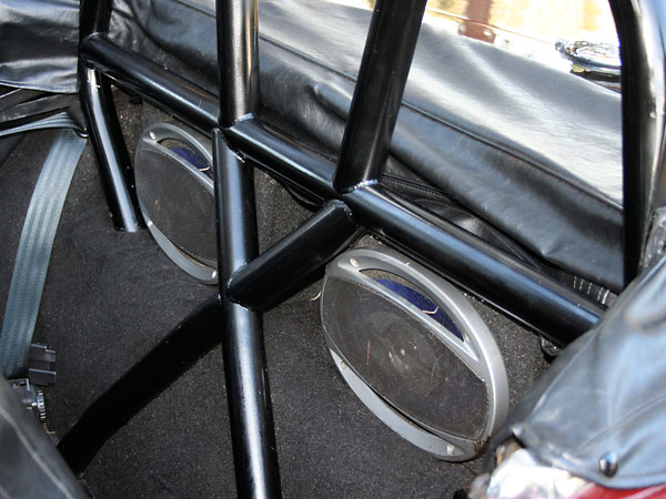 2 hoop rollbar custom built to match contour of Miata seats with 3 frame connects.