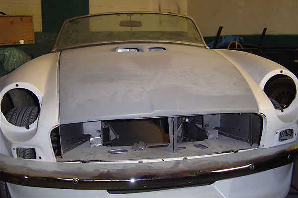 adding small verticle panels on either side of the grille
