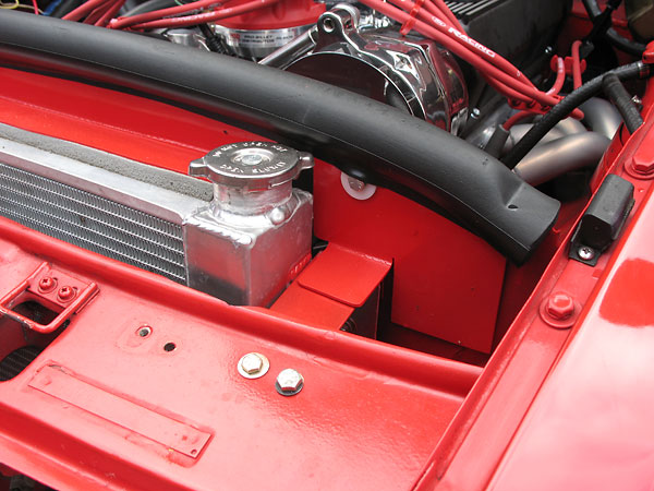 A recirculation shield also prevents air from bypassing the radiator.
