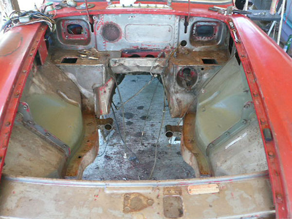 Preparing the MGB engine bay. No cutting of the bodyshell is required.