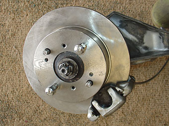 I installed the calipers, remembering to first bleed the system with the calipers upright.