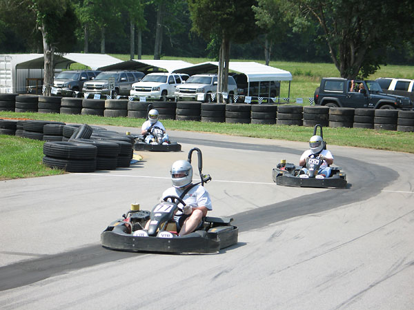 Graham Creswick, Richard Moor and Steve Degroat entering the front straight.