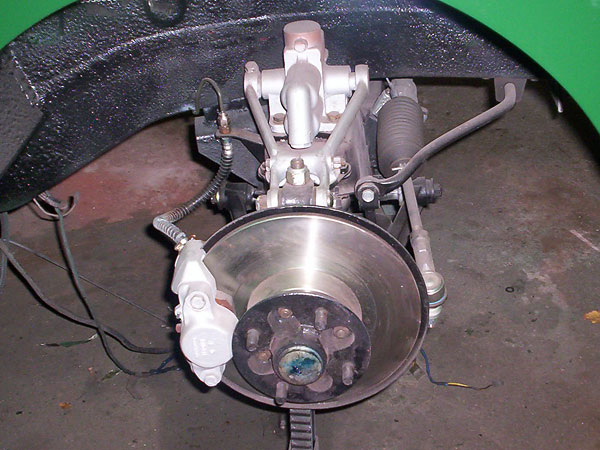 Two inch spacers between front crossmember and body.