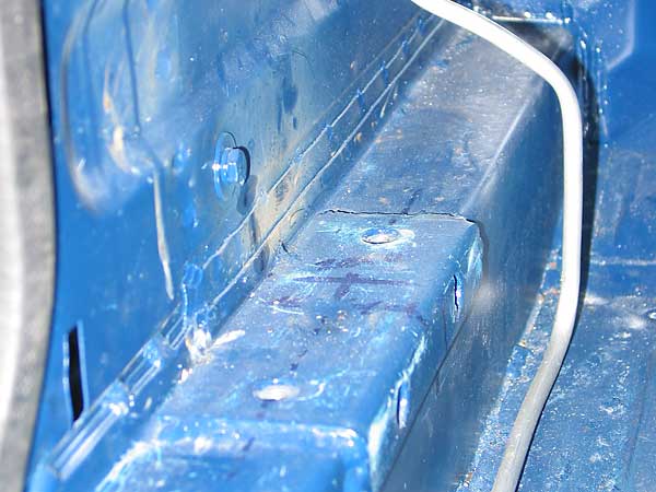 Front roll-cage mounting flanges (notice convenient theaded inserts)