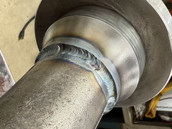 He has the jig, lathe, TIG welder, and experience to do it right.
