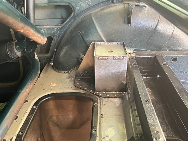 Coilover shock absorber mounting brackets, viewed from above.