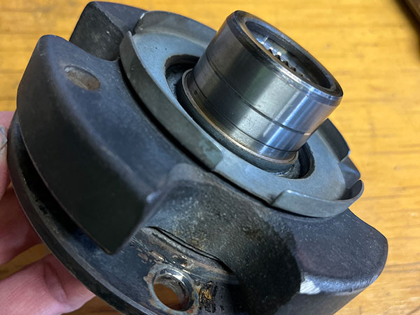 Manual transmission Miatas come with vibration dampeners installed on their prop-shaft flanges.