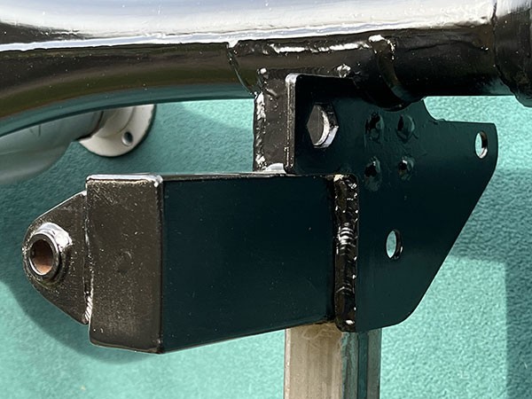 Passenger side lower link / coilover bracket also supports the Panhard bar.