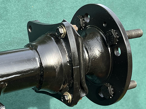 I designed the brake caliper brackets to suit Miata calipers.