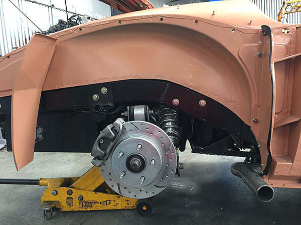 Stock Ford caliper, knuckle, and aftermarket rotor.