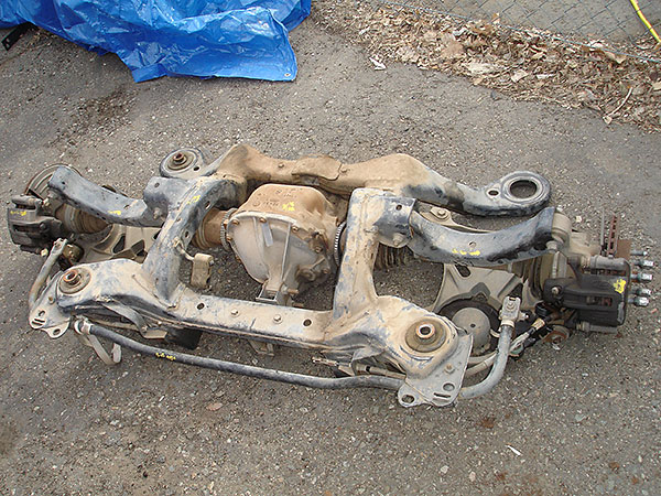 1995 Thunderbird rear suspension including 3rd member, knuckles, and calipers.