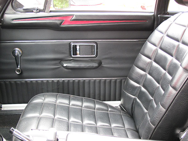 Custom upholstery on door caps.