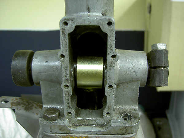 The pivot rod has been machined and now the coilovers mount directly to it.