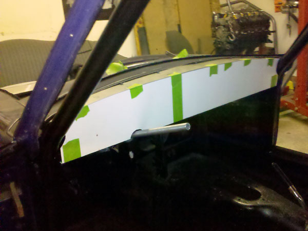 Poster board mock-up from which an aluminum dashboard will be made.