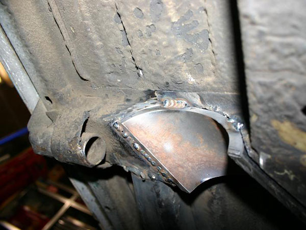 Cut-outs to facilitate exhaust pipe routing.
