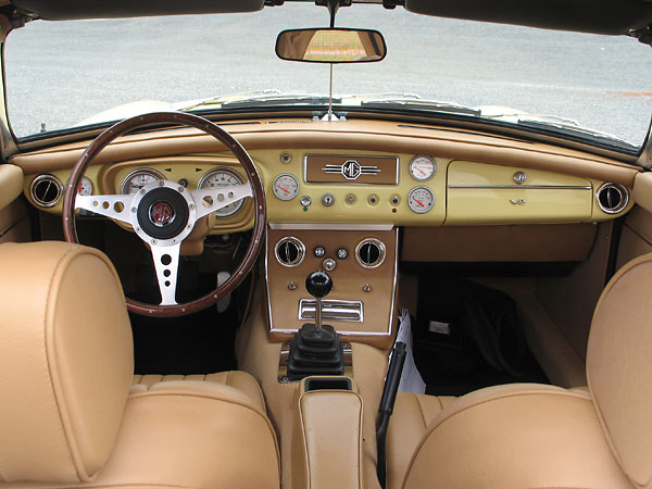 MGB steel dashboard, repainted body color.