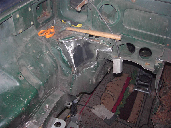 Piece by piece, the firewall is rebuilt with new sheet metal.