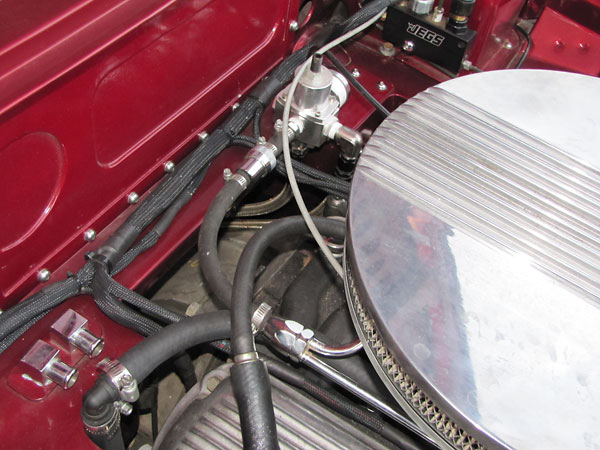 Bottom left: hoses for the re-located cabin heater haven't been hooked up yet.