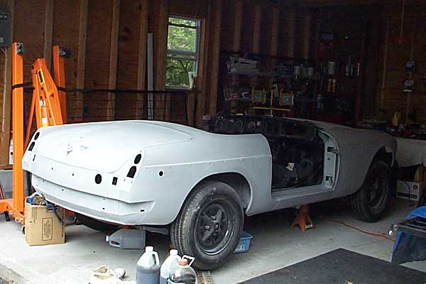 Car in primer, ready for final sanding and paint.