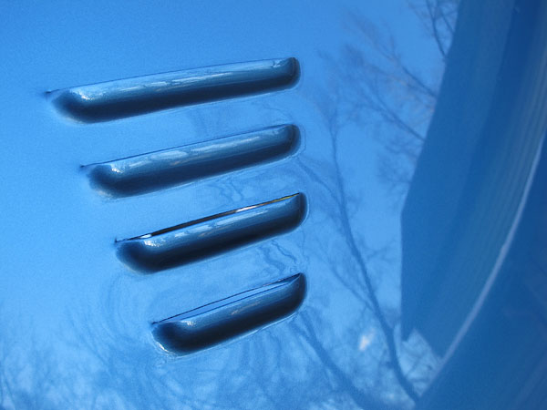 Hood louvers were cut by The Tin Element in Loveland, Colorado.