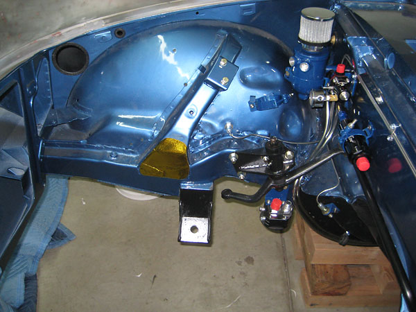 Sunbeam Alpine steering idler arm. MaxSpeed Motorsports remote oil filter mount.