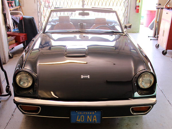 The Rover 3.5 V8 fits nicely under a Jensen Healey's low, low hoodline.