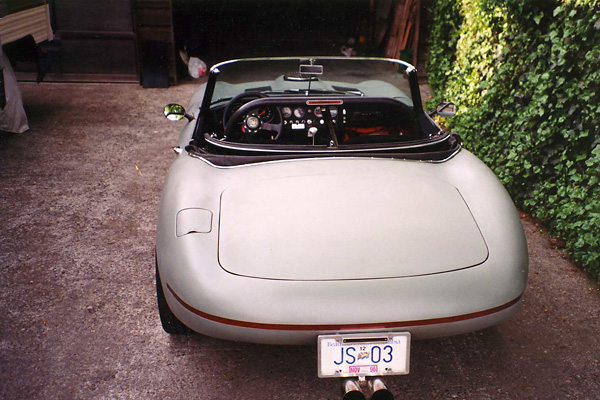License plate supported by the exhaust tips.