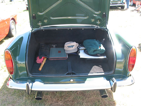 trunk = boot. Dual exhaust with chrome tips.