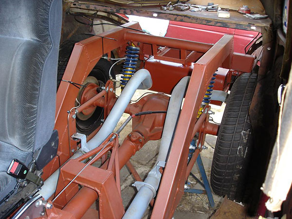 Fully adjustable rose-jointed 4-link rear suspension, plus Panhard rod.