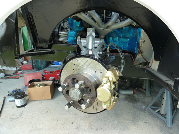 MGB front brakes, slightly upgraded with drilled and slotted rotors.